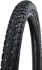 A close-up studio shot of a bicycle tire with studs. Podgląd zdjęcia produktu