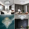 A collage of four images showing different crystal chandeliers in various interior settings. Produktbild-Vorschau