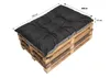A black cushion on a wooden pallet, with dimensions indicated. Voir les images du produit