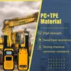 Two walkie-talkies are shown in the foreground with a construction site and city skyline in the background. Text overlays describe the product's material and features. Náhled obrázku produktu