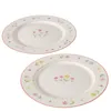 Two white plates with floral patterns are shown against a white background. Produktbild-Vorschau