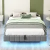 A bed with bedding and pillows in a room with green and white walls. Náhľad obrázku produktu