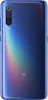 The back of a blue Xiaomi Mi 9 smartphone with a rainbow-like iridescent effect. Produktbild-Vorschau