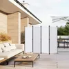 An outdoor patio scene with a sofa, coffee table, and a white folding screen divider. Produktbild-Vorschau