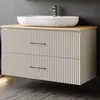 A modern bathroom vanity with a vessel sink and faucet. Produktbild-Vorschau