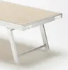A close-up of a section of a beach chair, showing the frame and the fabric. Produktbild-Vorschau