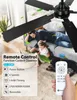 A family relaxing in a living room with a ceiling fan overhead and a remote control in the foreground. Produktbild-Vorschau