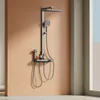A modern shower system mounted on a peach-colored wall, with a window in the background. Anteprima dell’immagine prodotto