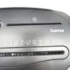 A close-up view of a gray paper shredder, focusing on the brand logo and various symbols indicating its capabilities. Produktbild-Vorschau