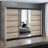 A modern sliding door wardrobe with a mirrored center panel and wood-effect doors, set in a room with a concrete wall and curtains. Produktbild-Vorschau