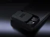 Close-up of the back of a black smartphone case with a sliding camera cover. Náhled obrázku produktu