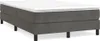 A dark gray boxspring bed with a white mattress on top, shown from a side angle with black legs. Náhled obrázku produktu