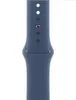 A close-up of a blue watch band with holes for adjustment. Produktbild-Vorschau