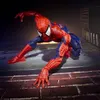 A Spider-Man action figure in a dynamic pose on a brick surface with graffiti in the background. Podgląd zdjęcia produktu