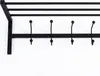 A black metal coat rack with multiple hooks and a shelf above, mounted on a white wall. Produktbild-Vorschau