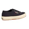 A side view of a navy blue Superga sneaker with a white sole and brown outsole, set against a white background. Produktbild-Vorschau