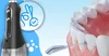 A close-up illustration of a water flosser being used on teeth, with a product shot of the device and a graphic indicating approval. Voir les images du produit