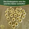 Heart-shaped pasta pieces arranged on a textured brown surface. Produktbild-Vorschau