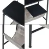 A collage of four close-up shots of a black metal side table with a fabric storage pouch. Produktbild-Vorschau