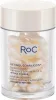 A clear, well-lit studio shot of a RoC Retinol Correxion Line Smoothing Night Serum bottle filled with individual serum capsules. Anteprima dell’immagine prodotto