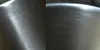 A close-up view of a brushed stainless steel surface, likely a kitchen sink. Produktbild-Vorschau