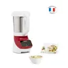 A soup maker appliance with a bowl of soup and a recipe card, set against a white background. Voir les images du produit
