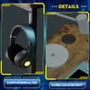 A split image showing a pair of headphones on a stand on the left and a close-up of a desk surface with a wireless charger and cable management port on the right. The image is framed with futuristic blue and yellow borders and includes text highlighting pr Náhľad obrázku produktu
