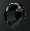 A black motorcycle helmet is shown against a dark gray background. Voir les images du produit
