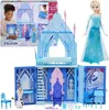 A product shot of a Frozen-themed ice castle playset with a doll and accessories, shown with its packaging. Náhľad obrázku produktu