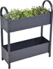 A two-tiered planter with artificial plants. Podgląd zdjęcia produktu