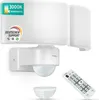 A white LED floodlight with a motion sensor and remote control is displayed against a white background. Anteprima dell’immagine prodotto