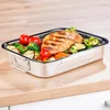 A stainless steel roasting pan filled with grilled chicken and roasted vegetables, placed on a wooden countertop. Náhľad obrázku produktu
