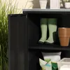 An open black outdoor storage cabinet with gardening items inside. Produktbild-Vorschau