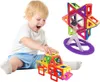 A young child is playing with magnetic building blocks, constructing a car and a Ferris wheel. Náhled obrázku produktu