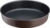 A close-up, angled view of a round baking pan. Voir les images du produit