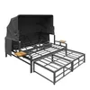 A metal frame garden lounge set with a black fabric canopy and wooden armrests, shown with an extended pull-out section. Anteprima dell’immagine prodotto