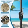 A close-up of a beach umbrella pole with a crank mechanism, set against a backdrop of a beach and ocean. Anteprima dell’immagine prodotto
