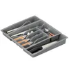 A grey plastic cutlery organizer filled with various utensils, including knives, forks, spoons, and a whisk. Produktbild-Vorschau