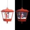 A split image showing a red Christmas lantern with a Santa Claus figurine inside. The left side has a white background, and the right side has a black background, simulating day and night. Náhľad obrázku produktu