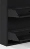 A close-up view of the interior of a black shoe cabinet, showing two open shelves. Produktbild-Vorschau