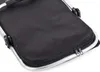 A close-up view of a black fabric shopping or picnic basket with a silver metal frame and a zipper. Náhled obrázku produktu