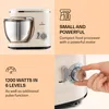 A collage featuring different angles and details of a cream-colored stand mixer, with accompanying text highlighting its features. Náhľad obrázku produktu