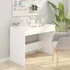 A white desk with books and a plant in a room. Anteprima dell’immagine prodotto