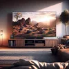 A living room scene with a large TV displaying a landscape, a media console, and a couch. Anteprima dell’immagine prodotto