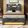 A modern bedroom with a grey upholstered bed frame featuring LED lighting and a headboard with storage. Podgląd zdjęcia produktu