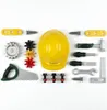 A collection of toy construction tools and accessories laid out on a white background. Produktbild-Vorschau