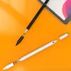 Two stylus pens, one black and one white, are shown on an orange surface next to a tablet. Podgląd zdjęcia produktu