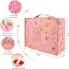 A pink cosmetic bag with a cat pattern, shown with various compartments and accessories, along with its dimensions. Produktbild-Vorschau