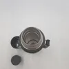 A top-down view of an open Stanley thermos bottle with its lid and cap beside it. Náhled obrázku produktu