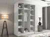 A modern white wardrobe with shelves and hanging space, shown in a room with a floor lamp and decorative statue. Produktbild-Vorschau